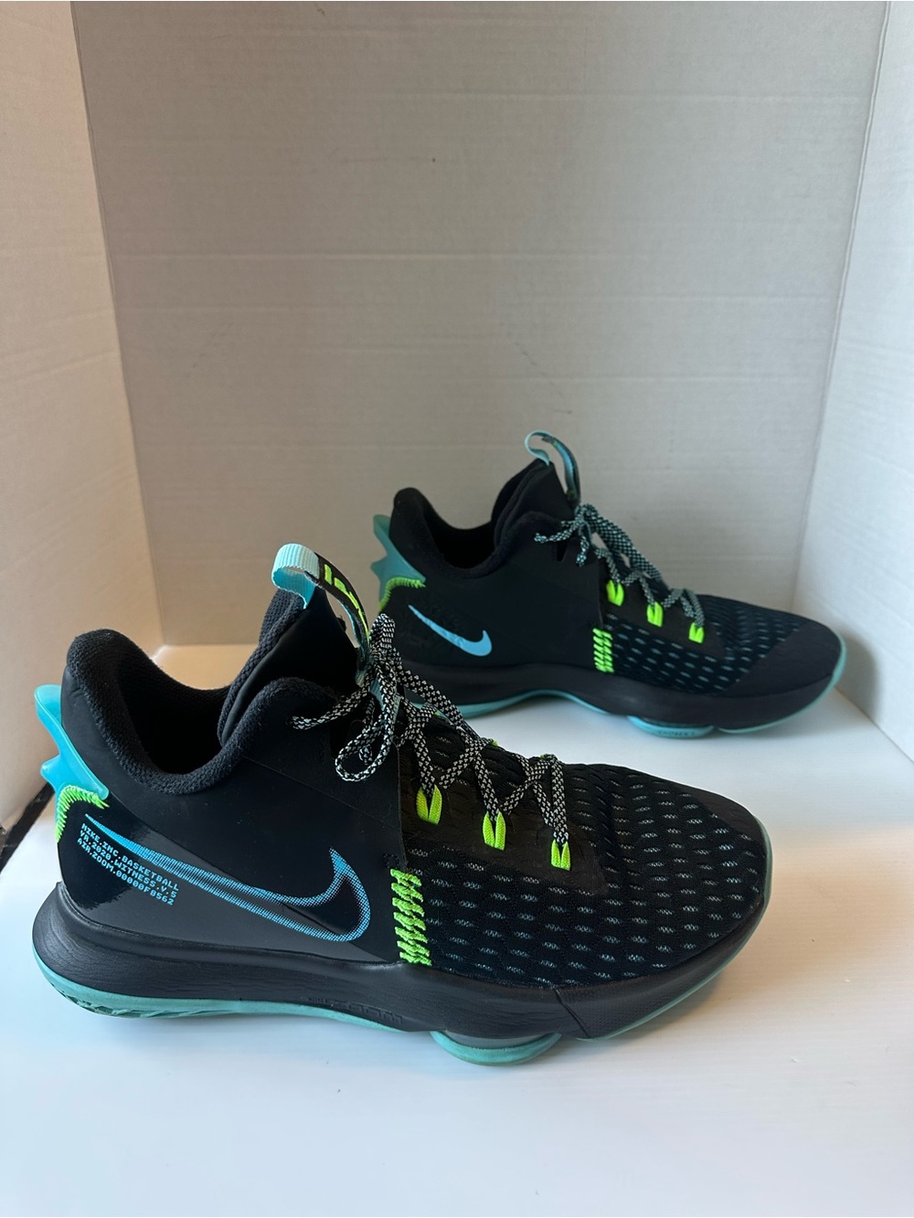 Nike Black Athletic Shoes with Teal & Neon Green Accents
